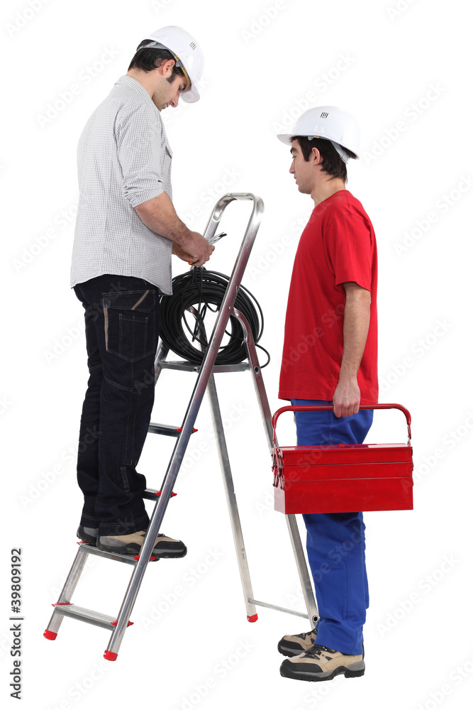 craftsman and apprentice working together craftsman and apprentice working together