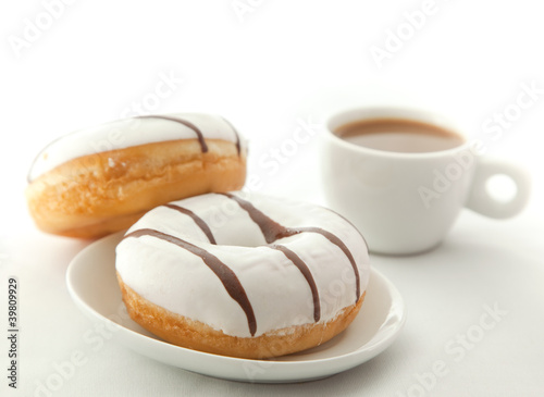 Donuts with cup of coffee