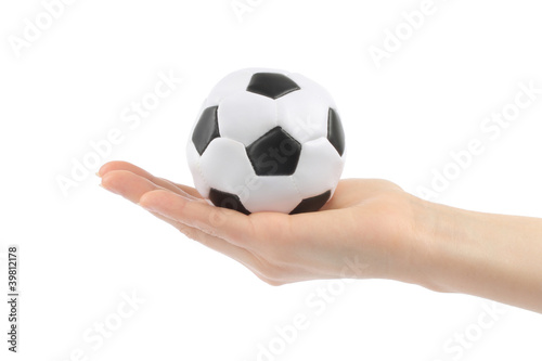 Woman hand with football on white background