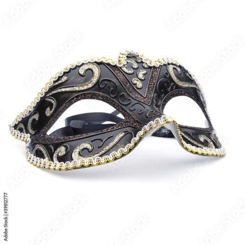 One black masquerade mask on white