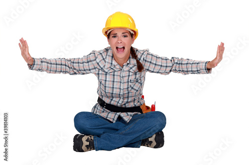 Woman carpenter screaming