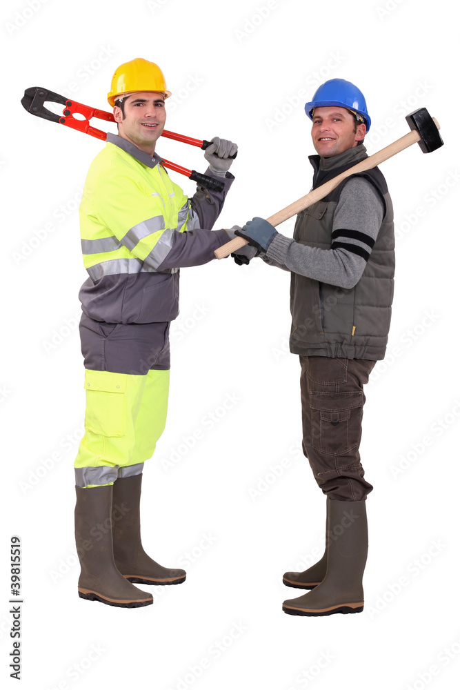 Construction workers shaking hands Construction workers shaking hands