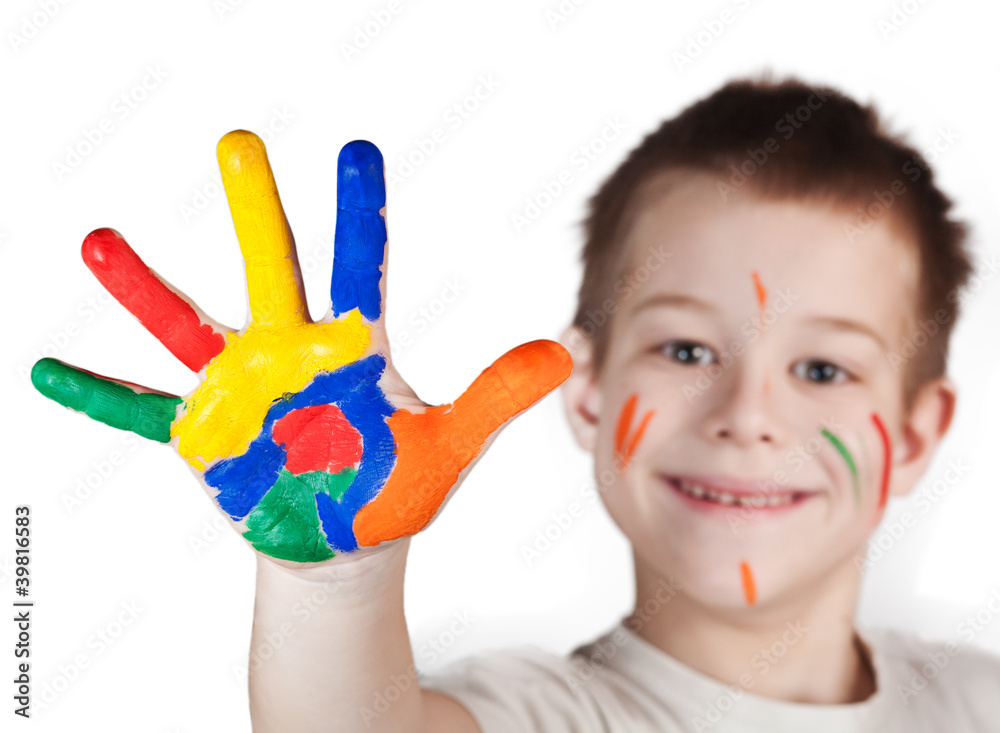 child showing his colored hands child showing his colored hands