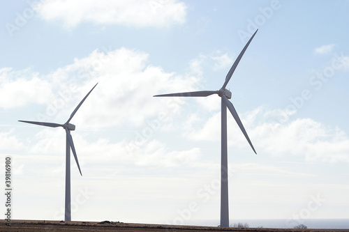 Two windmills in syncronized turn