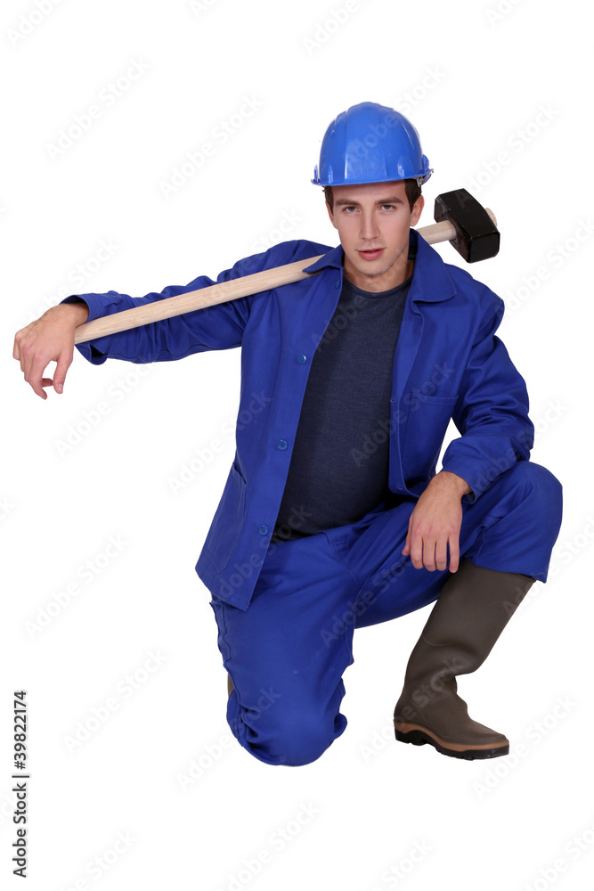 Young construction worker on white background Young construction worker on white background