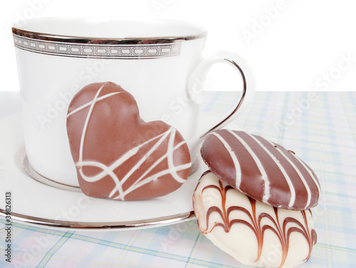 Chocolate assorty  cookies  with cup of tee photo