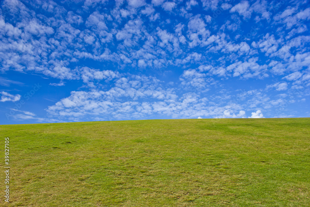 green hills and blue sky