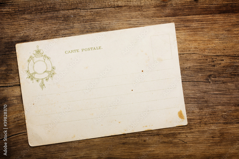 Retro 1900th postcard on wooden table