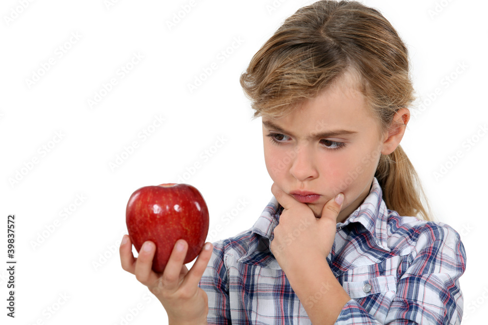 Little girl holding apple Little girl holding apple