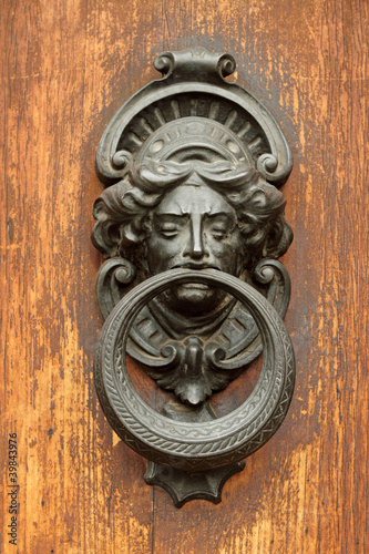 elegant antique door knocker