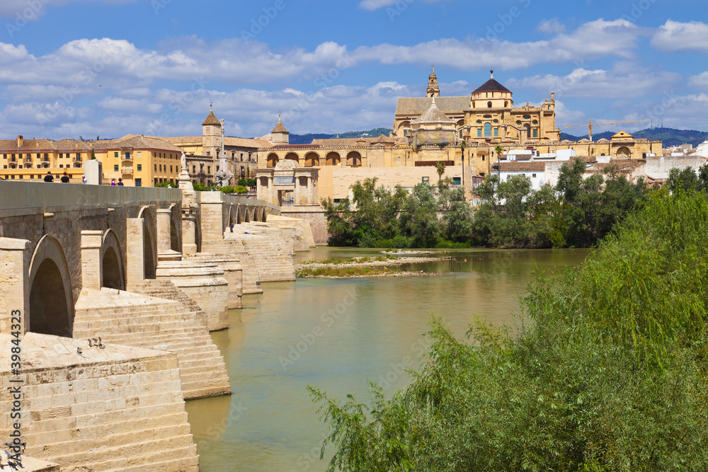 Guadalquivir River through Cordoba's Roman bridge and the Mosque