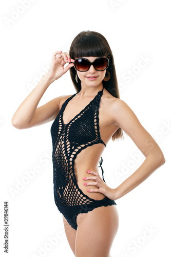 Sexy underwear model posing in a studio in a handmade swimsuit © fyb