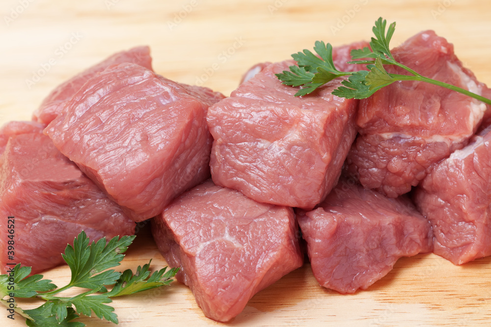 Fresh Raw meat on a cutting board Fresh Raw meat on a cutting board