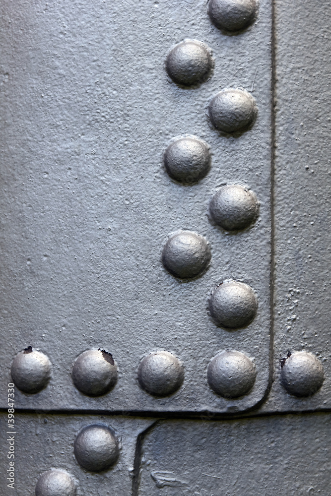 Metal surface with rivets