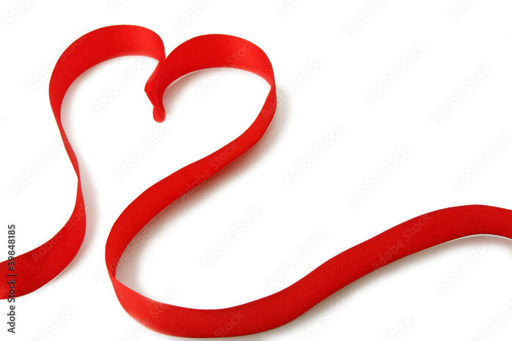 red silk ribbon on the white background red silk ribbon on the white background