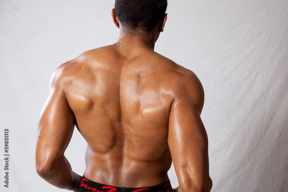 Strong, shirtless black man back to the camera Stock Photo | Adobe Stock