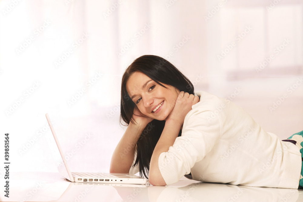 Woman Using Laptop Relaxing Sitting On Sofa At Home Woman Using Laptop Relaxing Sitting On Sofa At Home