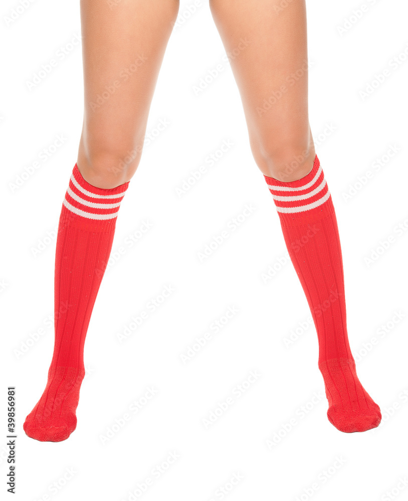a close up of female legs with soccer socks