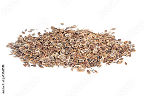 Pile Fennel seeds (Anethum graveolens) isolated on white
