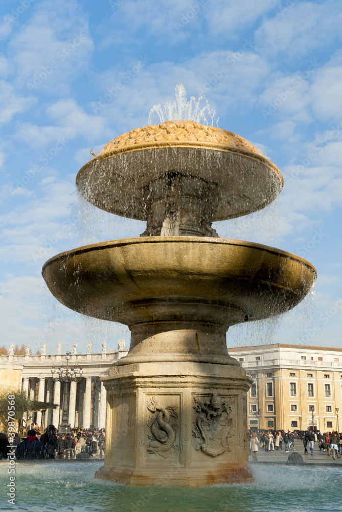 Fountain in St Peters Square in Rome Italy