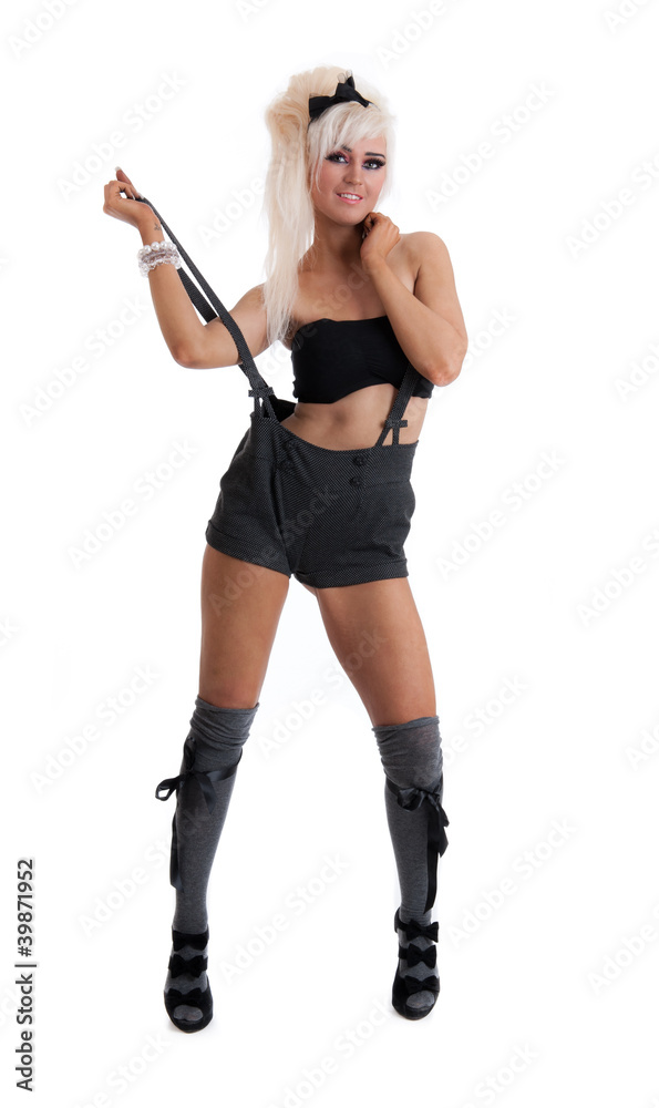 Happy young sexy female in shorts and braces Happy young sexy female in shorts and braces