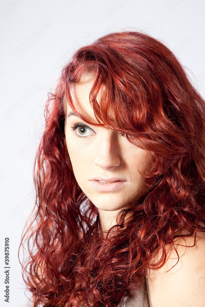 Redhead woman looking seriously Redhead woman looking seriously