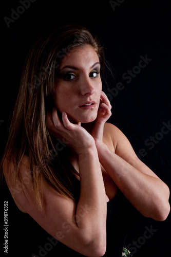 woman looking at the camera with serious expression