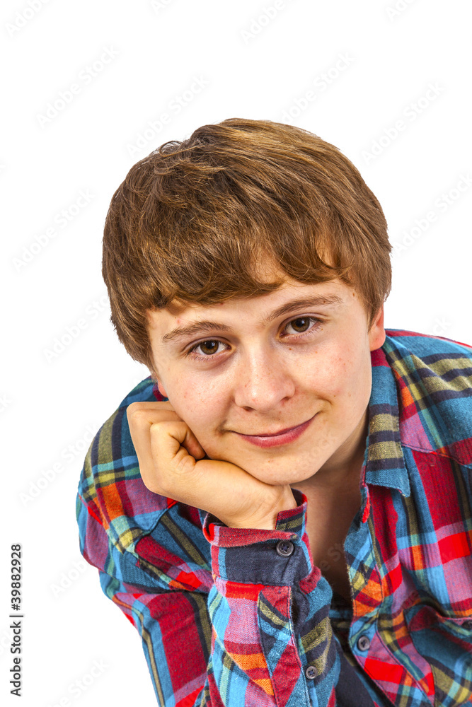 happy boy in studio looking confident and smart with head on his happy boy in studio looking confident and smart with head on his