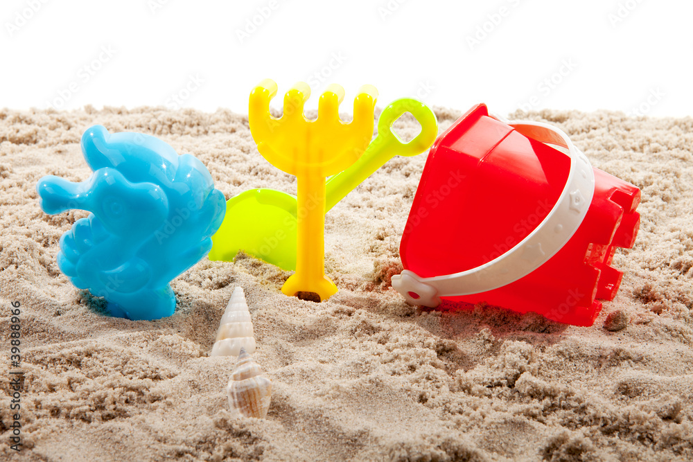 colorful plastic toys on the beach colorful plastic toys on the beach
