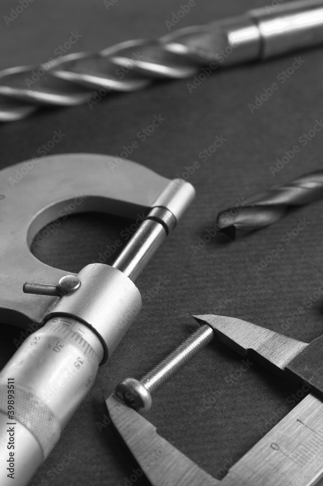 Details, drills and measuring tools, a close up Details, drills and measuring tools, a close up
