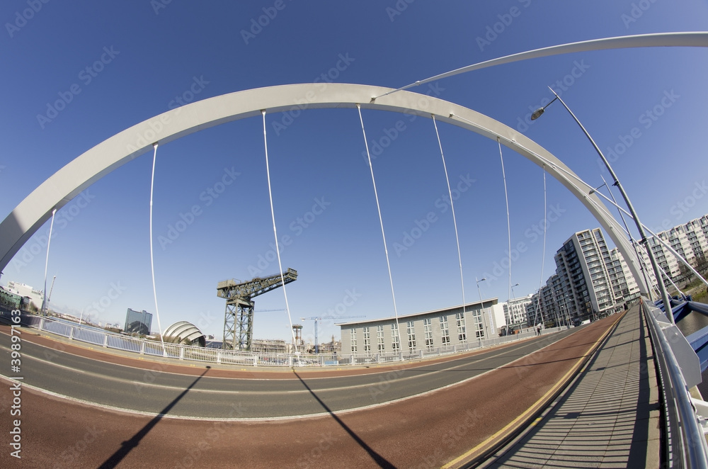 Fototapeta premium Unusual fisheye view of Glasgow Clyde Arc bridge and other landm