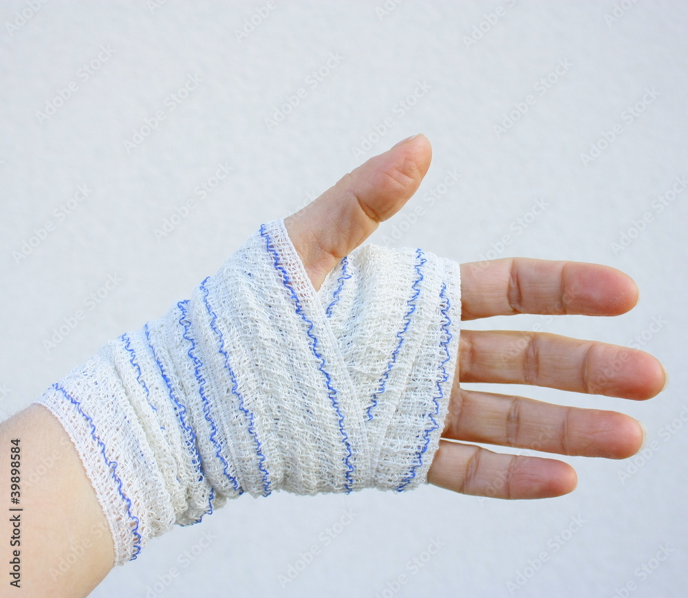 bandage main sur foulure Photos | Adobe Stock