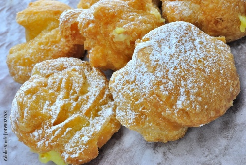 Bignè fritto ripieno di crema - Bignè di San Giuseppe photo