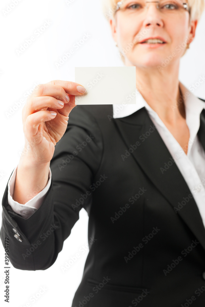 Mature woman showing her business card Mature woman showing her business card