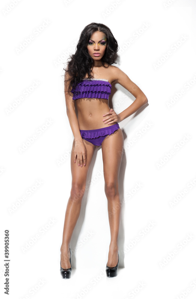 Portrait of sensual girl in swimsuit, isolated in studio. Portrait of sensual girl in swimsuit, isolated in studio.