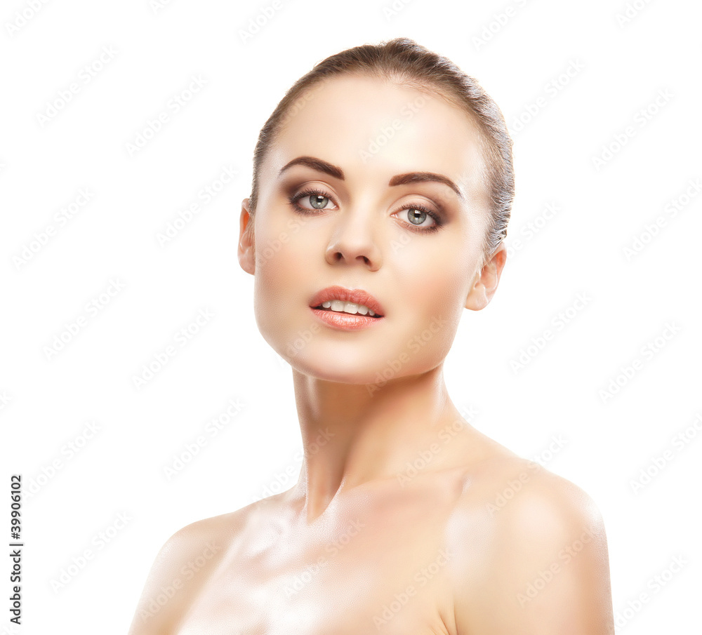 Portrait of a young brunette woman in a beautiful makeup