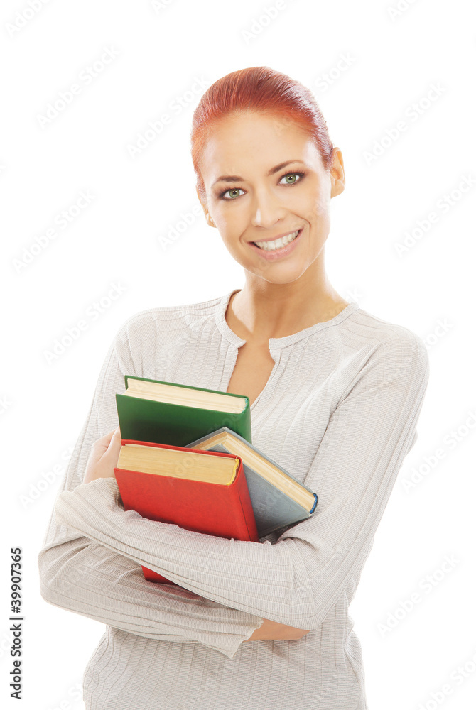 A young redhead Caucasian woman reading a book A young redhead Caucasian woman reading a book