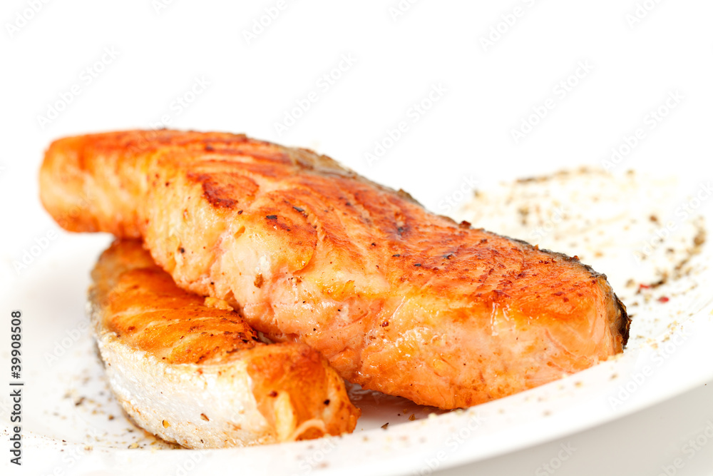 Fried salmon fillets with sauce