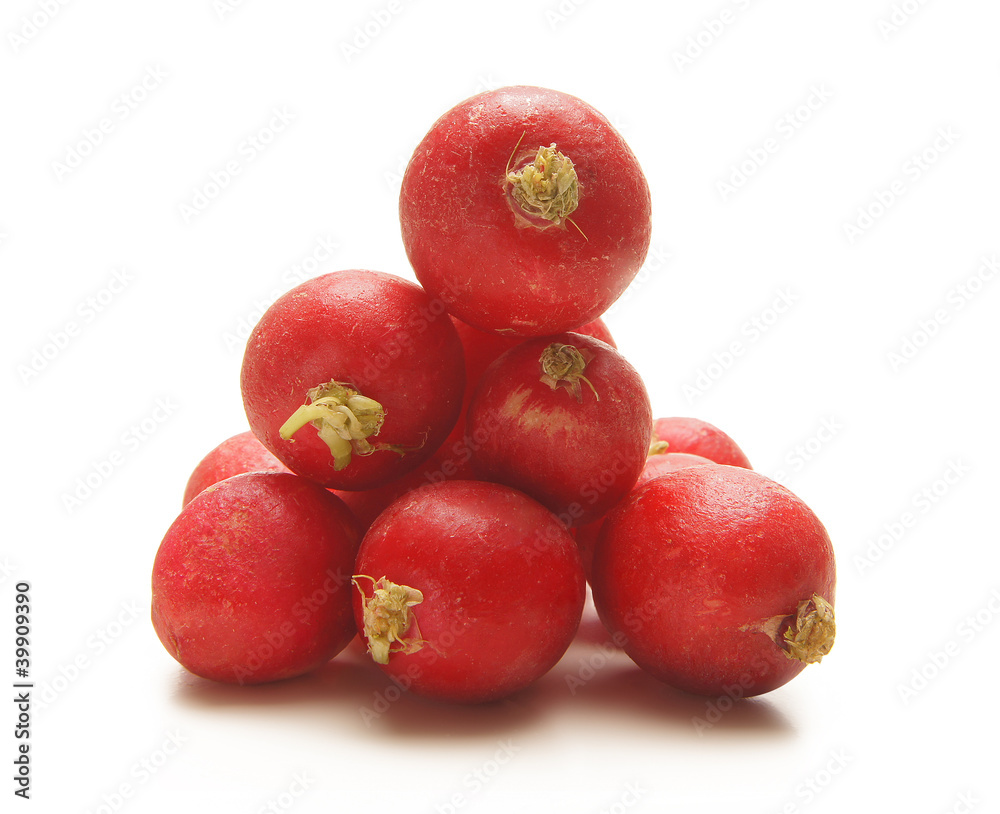 Fresh and tasty red radishes on a white background Fresh and tasty red radishes on a white background