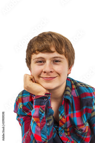 happy boy in studio looking confident and smart with head on his