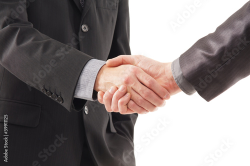 A close-up image of a handshake between two persons
