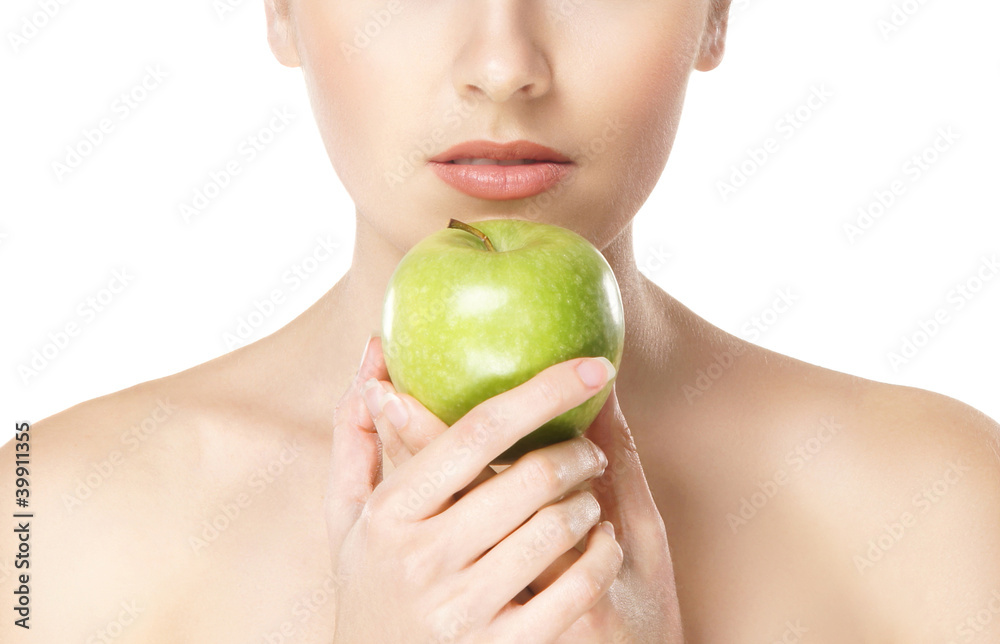 Portrait of a young naked woman holding an apple Portrait of a young naked woman holding an apple