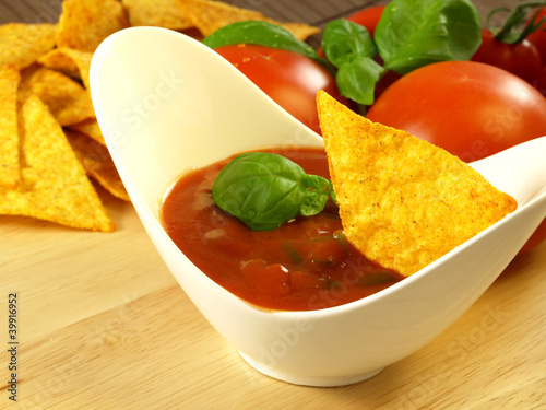 Salsa sauce with dipped nacho