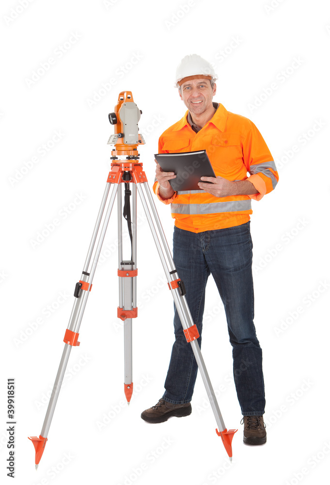 Senior land surveyor with theodolite Senior land surveyor with theodolite