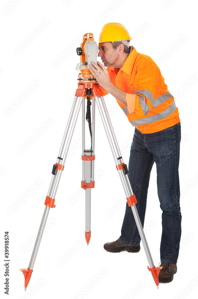 Senior land surveyor with theodolite Senior land surveyor with theodolite