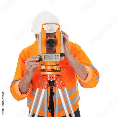 Senior land surveyor with theodolite photo