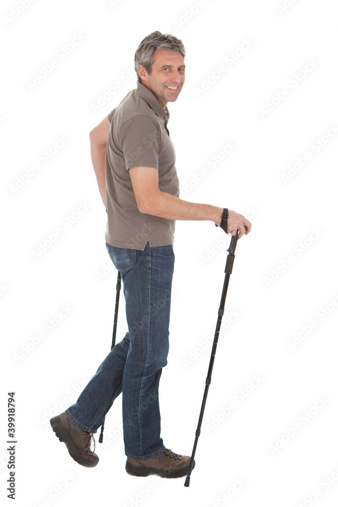 Senior man with hiking poles