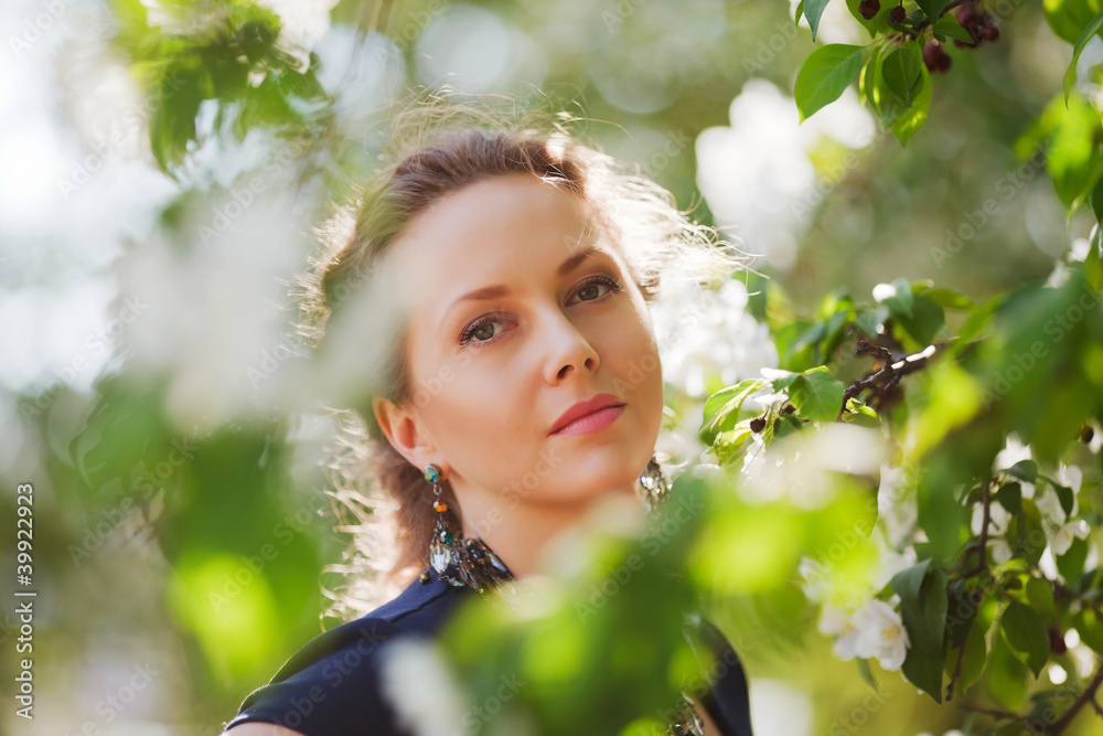 Beautiful woman in a spring garden Beautiful woman in a spring garden