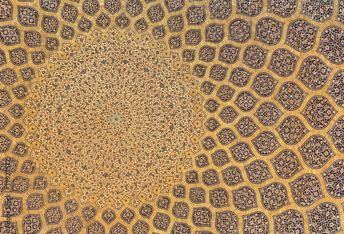 arabesque design inside dome of a mosque