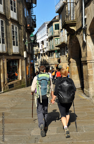 Peregrinos en las calles de Santiago de Compostela photo